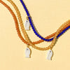 Mother of Pearl Fish Charm Beaded Necklace in Topaz