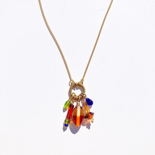 Cluster Charm Necklace with Two Tone Oval Bead