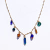 Charm Necklace with Topaz, Cobalt, and Teal Beads