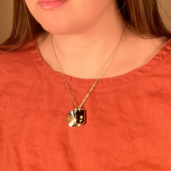 black-glass-sunburst-charm-necklace handmade jewelry by michelle starbuck designs