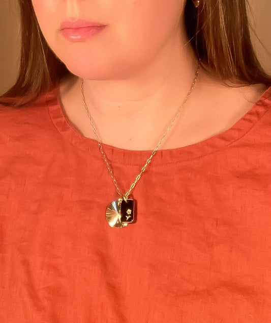 black-glass-sunburst-charm-necklace handmade jewelry by michelle starbuck designs