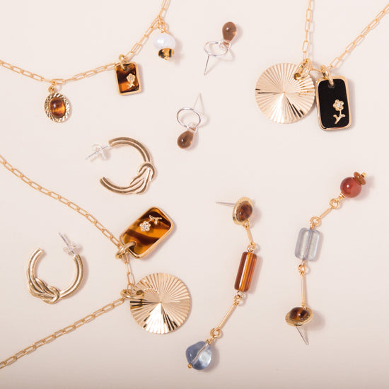 tortoise-glass-sunburst-charm-necklace handmade jewelry by michelle starbuck designs