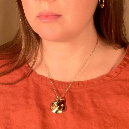 tortoise-glass-sunburst-charm-necklace handmade jewelry by michelle starbuck designs