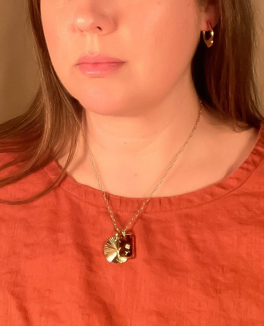 tortoise-glass-sunburst-charm-necklace handmade jewelry by michelle starbuck designs